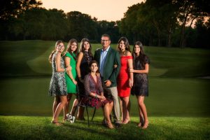 The Beautiful Milana Family Gathered Together on the Golf Course